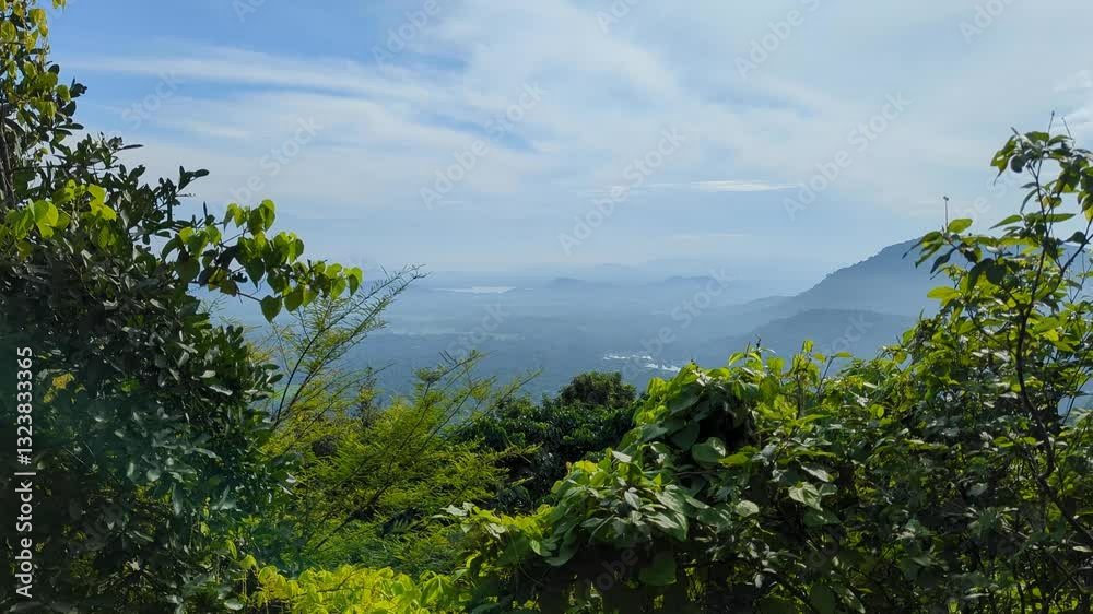 Glimpse of scenic mountainous landscape from lookout on 18 Bends Road Daha Ata Wanguwa road in central Sri Lanka Glimpse of scenic mountainous landscape from lookout on 18 Bends Road Daha Ata Wanguwa road in central Sri Lanka