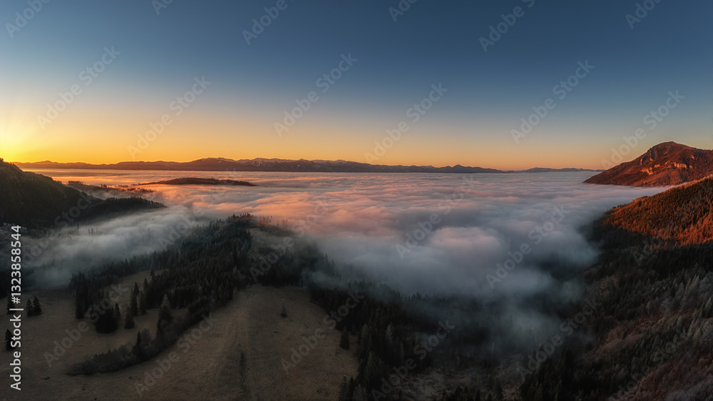 Fototapeta premium fog over the Liptovska Mara dam at sunrise