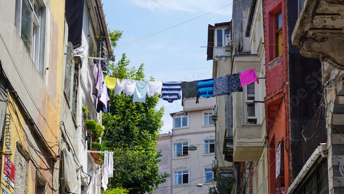 colorful houses in old town with clothes and laundry hanging outside on a rope