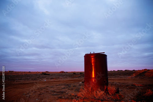 rusted old relic reflecting dawn light