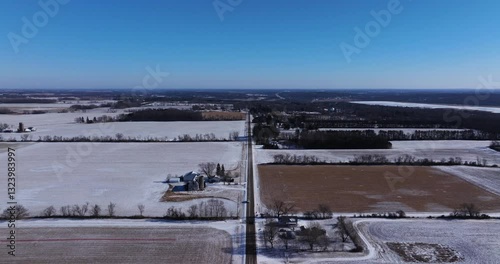 Wallpaper Mural Scenic Drone Shot Above Rural Farmland on Cold Winter Afternoon. Blue Sky Torontodigital.ca