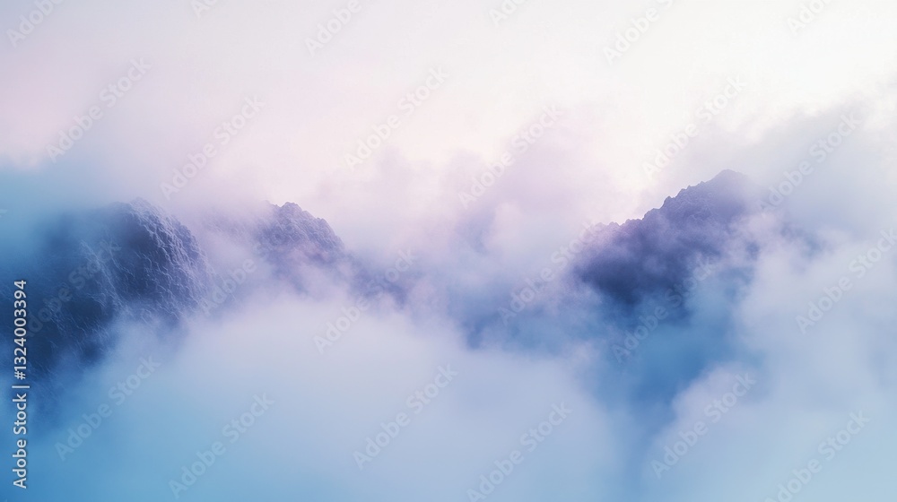 Obraz premium A serene landscape of misty mountains enveloped in soft clouds, creating a calming and ethereal atmosphere.