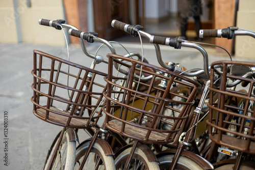 Obraz na płótnie Bicycle parking in the city. Ecological type of transport. Close-up. Renting bicycles for exploring the city w salonie