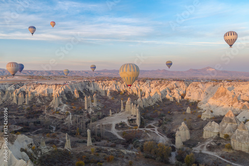 Obraz na płótnie Hot air balloons flying above rock formations, Goreme National Park, Goreme, Cappadocia, Anatolia, Turkey w salonie