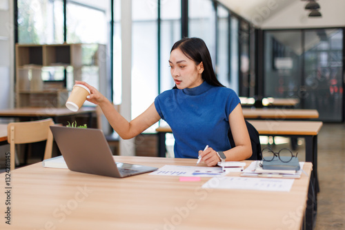 Free Download Business asian woman working in the office with working notepad, tablet and laptop documents tax, report, accounting, statistics, and analytical research concept
 - GFXLoad