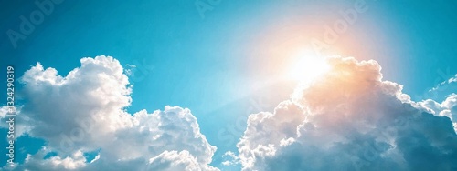 Panoramic blue sky with fluffy white clouds, a bright and clear atmosphere, perfect for a background banner or nature-themed design. photo
