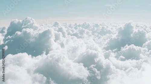 Panoramic blue sky with fluffy white clouds, a bright and clear atmosphere, perfect for a background banner or nature-themed design. photo