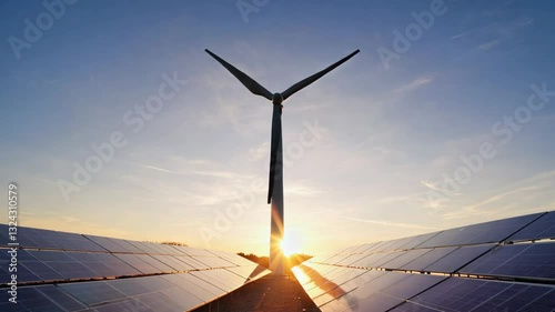 wind turbine with solar panels sunset sky on top mountain. concept of clean energy. Energy supply, wind turbine,eolic turbine, distribution of energy,Powerplant,energy transmission,high voltage supply