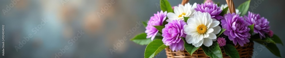 Fototapeta premium A basket filled with fresh purple and white flowers with green leaves, decorative, flowers