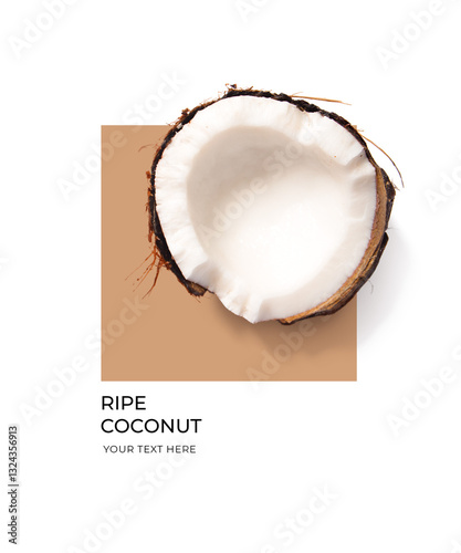 Creative layout made of coconut on the brown and white background. Flat lay. Food concept. Lemon on white background.