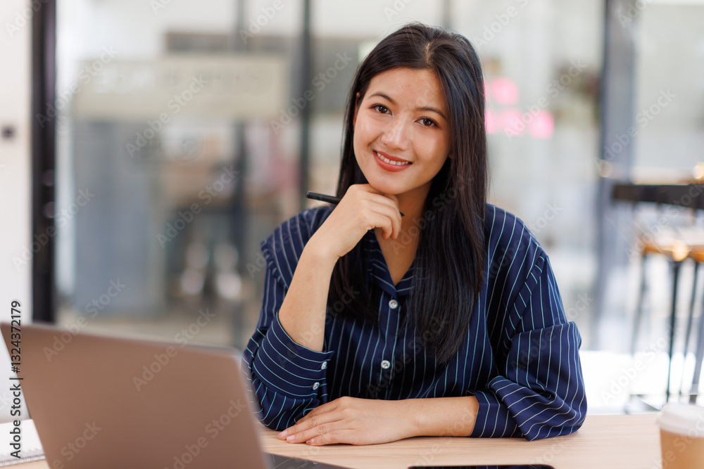 Asian businesswoman sits at desk with laptop online using internet and notepad happily recording receipt contact information online delivery.
Asian businesswoman sits at desk with laptop online using internet and notepad happily recording receipt contact information online delivery.