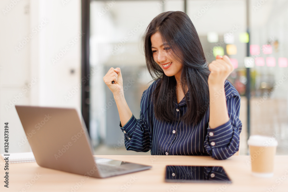 Asian businesswoman sits at desk with laptop online using internet and notepad happily recording receipt contact information online delivery.
Asian businesswoman sits at desk with laptop online using internet and notepad happily recording receipt contact information online delivery.