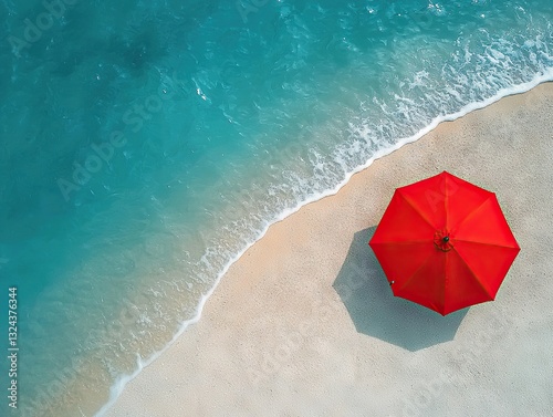 Relaxing day at the beach with a red umbrella tropical shoreline aerial view summer vibes photo