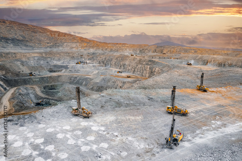Open coal mine, Drilling machine borer installing cast explosives blasting
