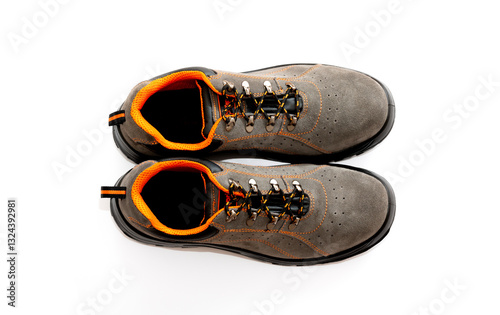 Pair of comfortable Brown working boots isolated on white, top view