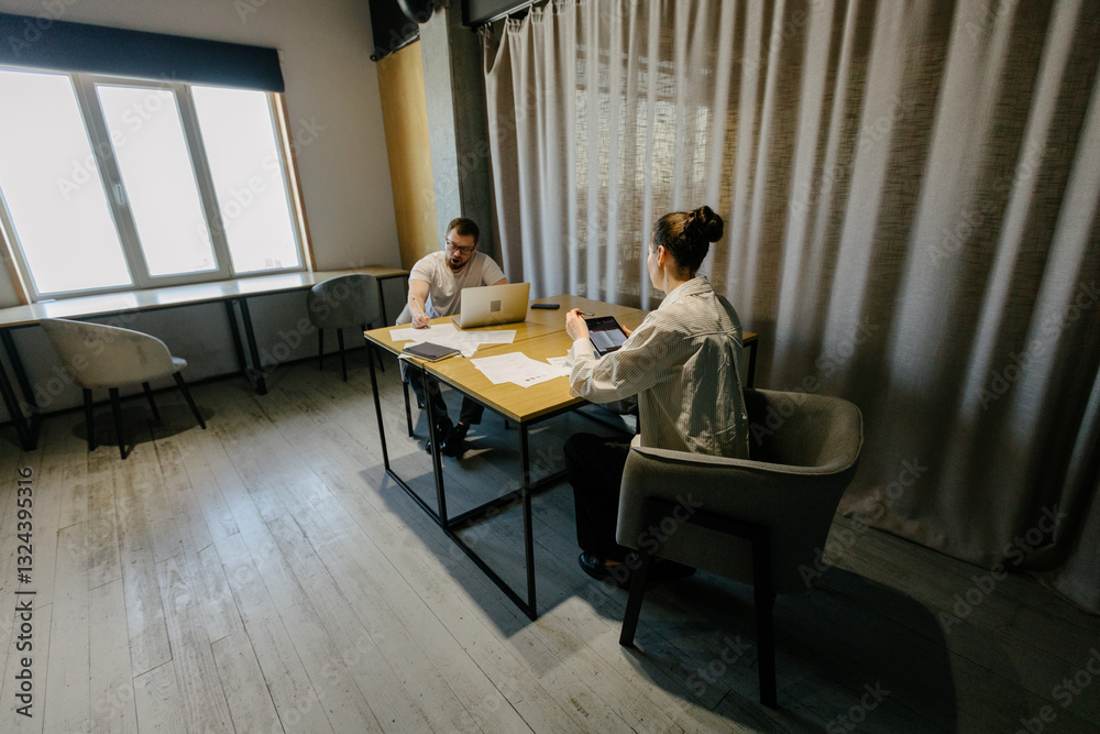 Fototapeta premium office workers doing paperwork