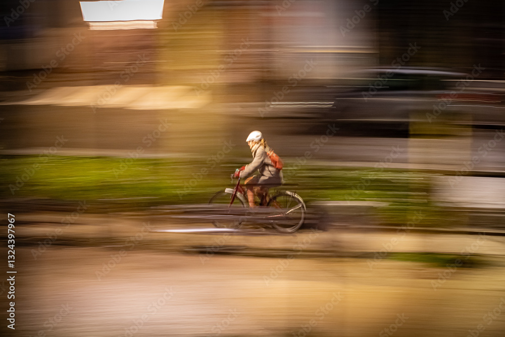 Fototapeta premium Biycle passing fast at night