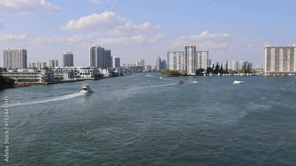 Sea channel river view with boats on water and modern buildings on the distance Sea channel river view with boats on water and modern buildings on the distance
