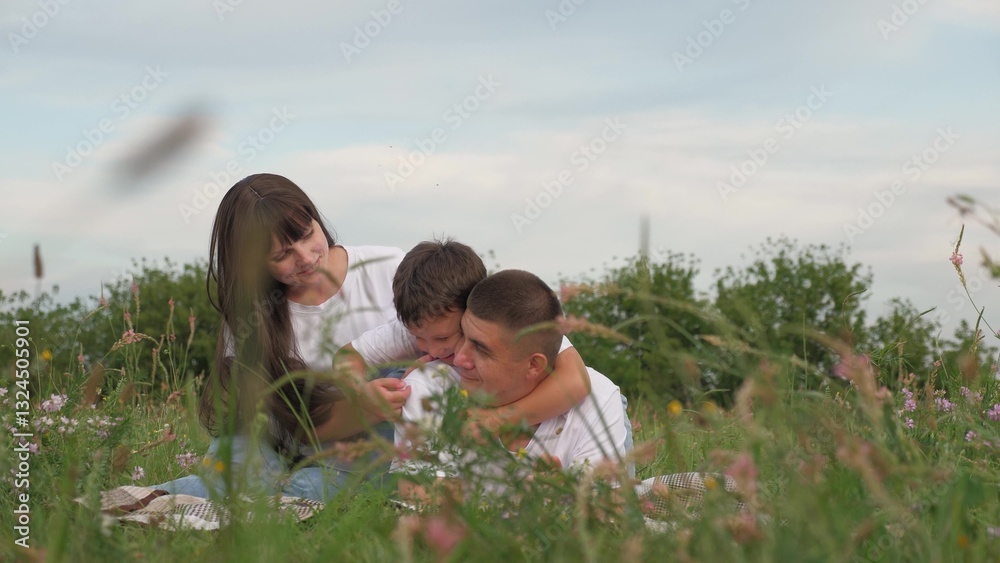 happy baby hugs dad outdoors, happy family, cheerful parent child relaxing green summer meadow, picnic outdoors, summer adventures, wife husband parent son child hugging together outdoors, smile face happy baby hugs dad outdoors, happy family, cheerful parent child relaxing green summer meadow, picnic outdoors, summer adventures, wife husband parent son child hugging together outdoors, smile face