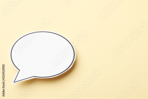 Blank speech bubble on beige background. Space for text