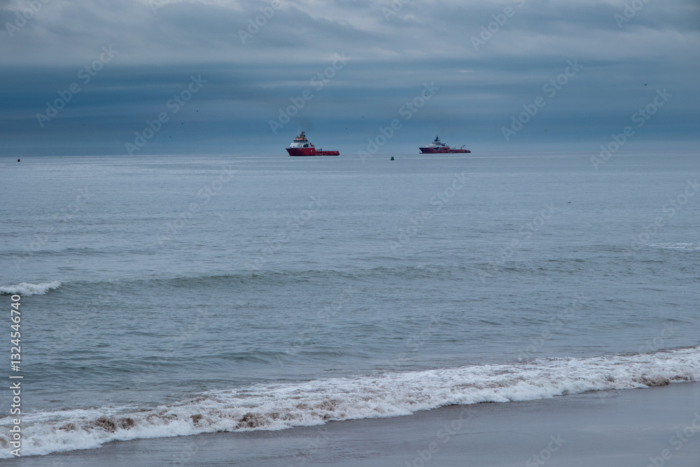 Cargo ships sailing on Atlantic ocean, north scotland
