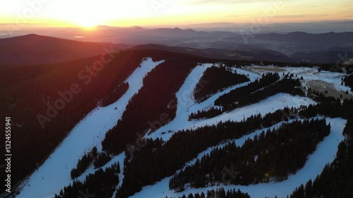 Aerial drone morning view of ski resort Rogla at sunrise dawn. Panoramic winter shot of Ski center Rogla, Slovenia