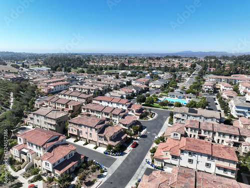 Obraz na płótnie Aerial view of middle class community identical condominium apartment, Oceanside, South California, USA. w salonie