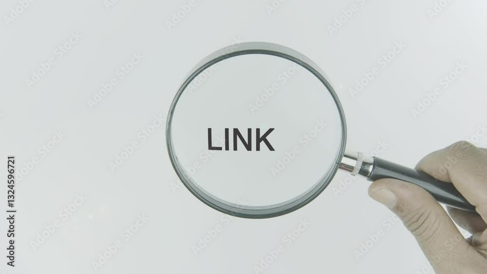 Link text or word highlighted by a magnifying glass in a hand on a white background, symbolizing a connection or reference between web pages, resources, or ideas