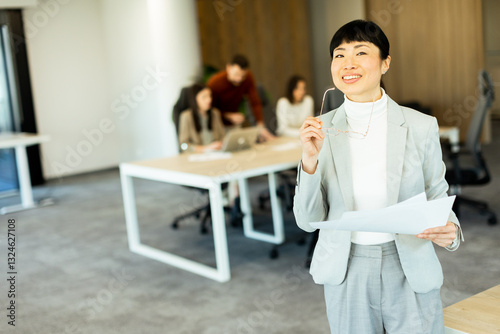 Professional Asian woman le...