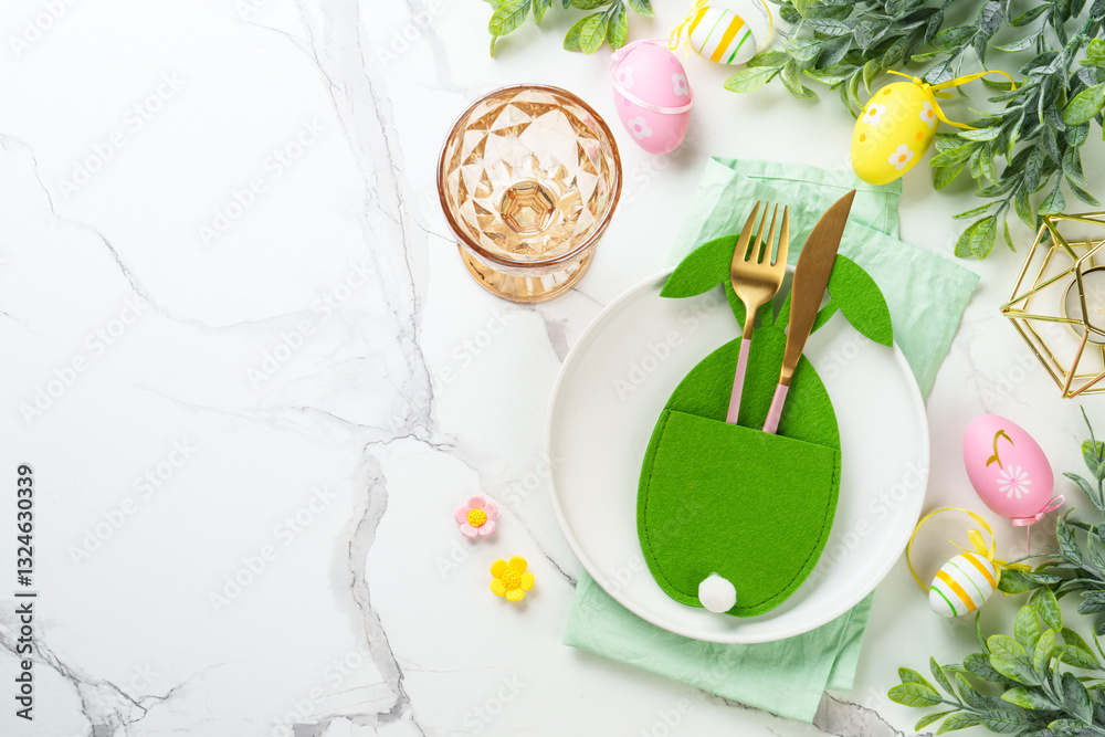 Easter table setting on white background.