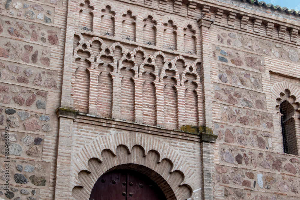 Obraz premium Mudejar style brick decoration on the façade of the church of Santa Leocadia in Toledo