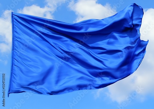 Waving blue flag against a partially cloudy sky