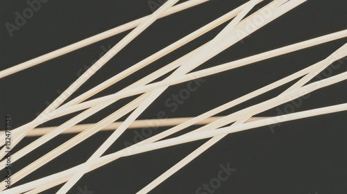 Intricate light bulb filaments show stunning detail, highlighting delicate textures and patterns against a dark backdrop