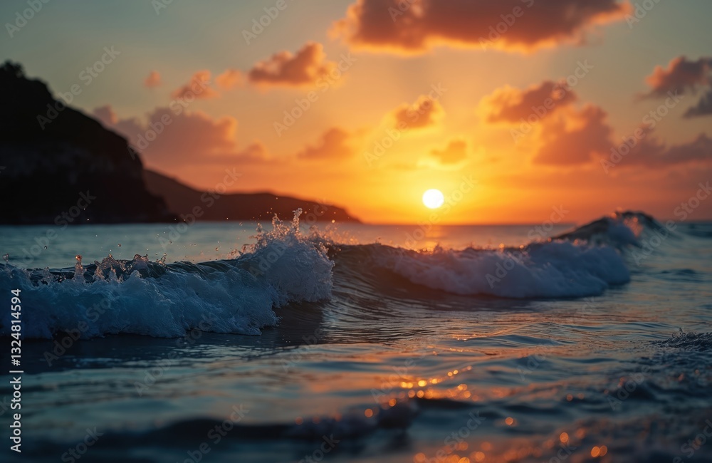 Obraz premium Low angle shot of sea wave breaks at sunrise in gold, blue colors. Water surface reflects sun rays. Serene morning sea scenery with gold sun, clouds, nature beauty.