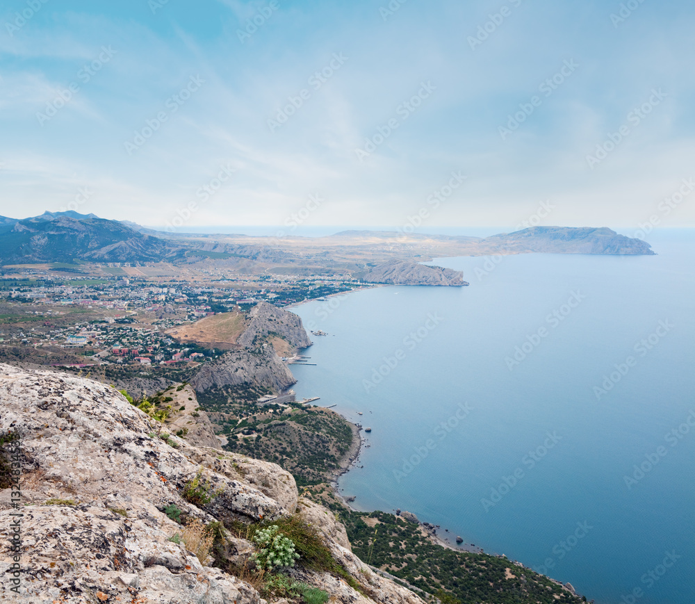 Summer rocky coastline (Sudak town, Crimea, Ukraine)