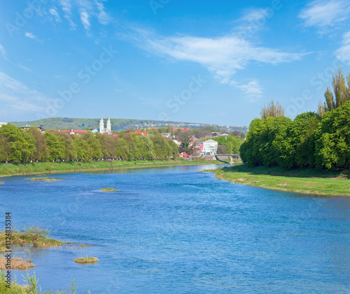 Obraz na płótnie Day urban view with Uzh river and Greek Catholic Cathedral and Linden Avenue behind (Uzhgorod City, Ukraine) w salonie