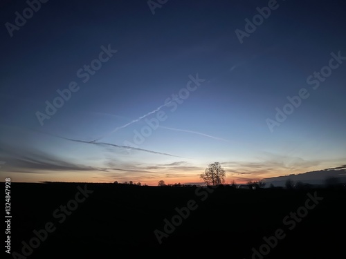 Plane lines at sunrise