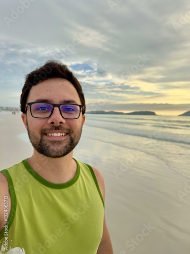 Man smiling on a serene beach
