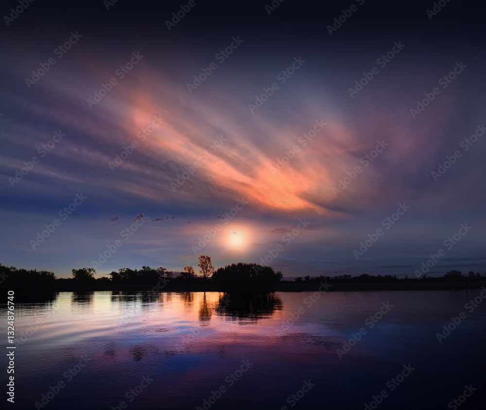spectacularly and colorful sunset at Yellow Waters Billabong, Kakadu National Park, Northern Territory, Australia
spectacularly and colorful sunset at Yellow Waters Billabong, Kakadu National Park, Northern Territory, Australia