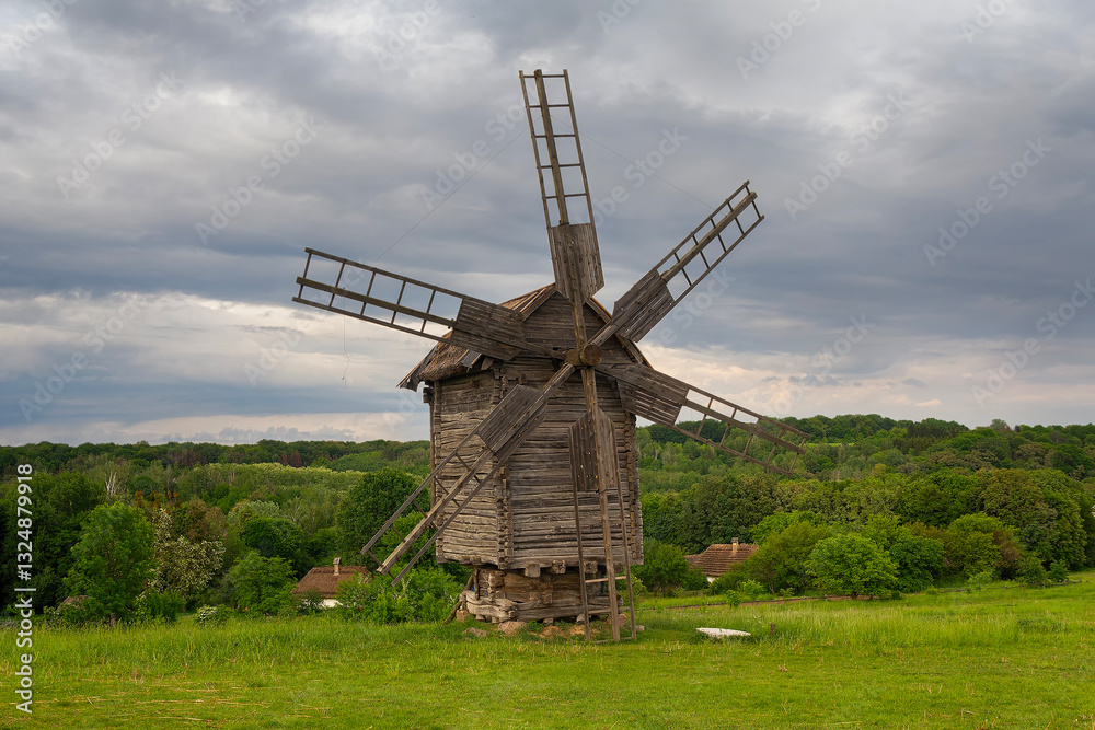 Traditional ukrainian windmill in the museum of national architecture in Pirogovo. Kyiv, Ukraine Traditional ukrainian windmill in the museum of national architecture in Pirogovo. Kyiv, Ukraine