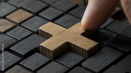 Wooden blocks with plus sign puzzle held by fingers, symbolizing addition and problem-solving

 photo
