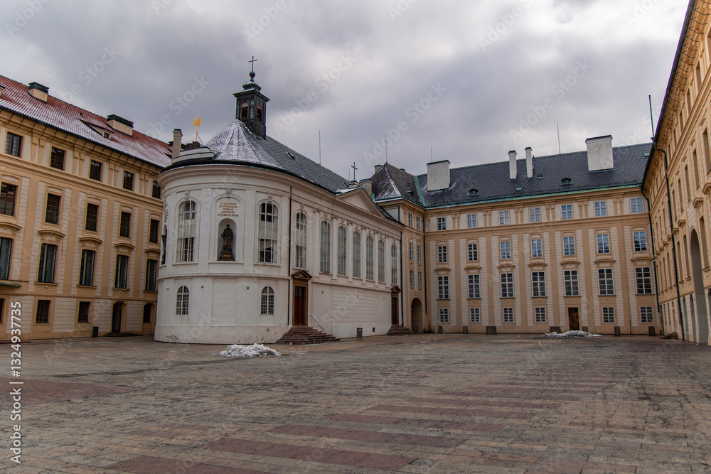 Fototapeta premium Holy Cross Chapel and old provincial house during winter in Prague Castle