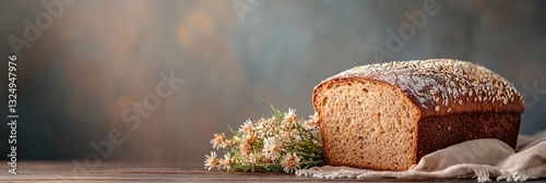 A slice of bread with flowers on top of it