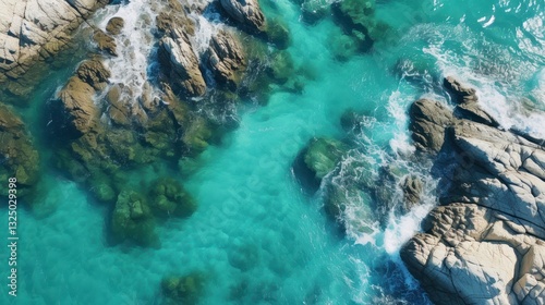 Aerial view of beautiful seascape with blue ocean waves and rocks