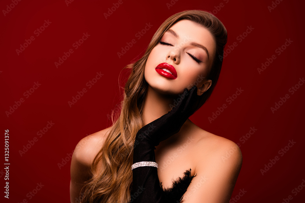 Fototapeta premium Classy chic lady with closed eyes touch tender skin face feeling tempting wear gloves jewel on red background