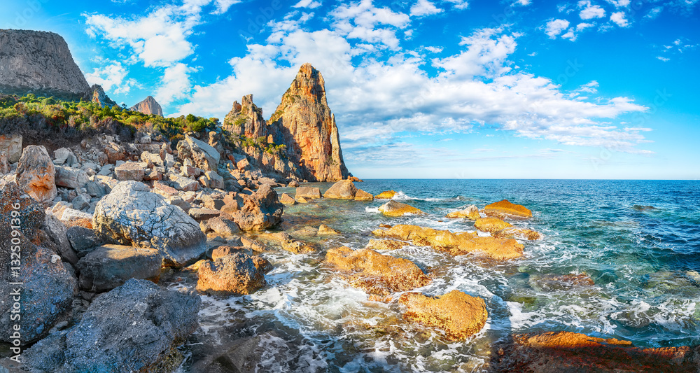 Exciting view of Punta Pedra Longa and azure water in sea.