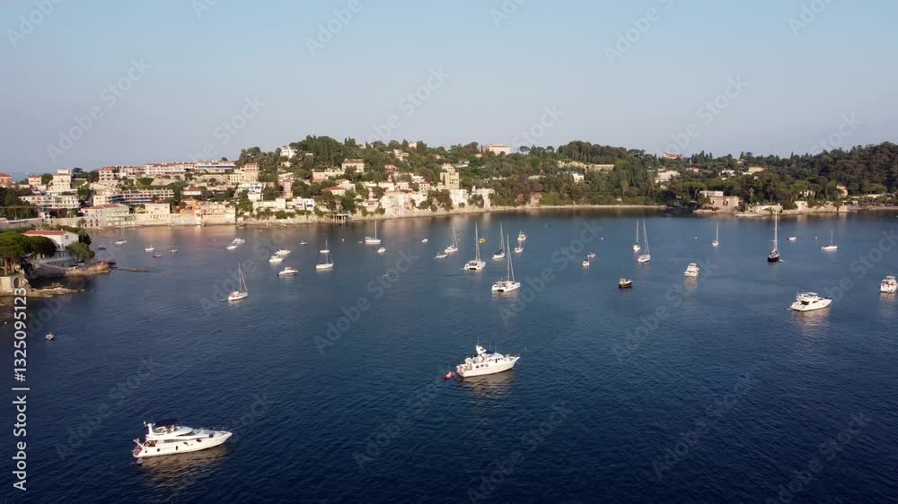 Aerial view of a serene harbor with boats on tranquil water Aerial view of a serene harbor with boats on tranquil water