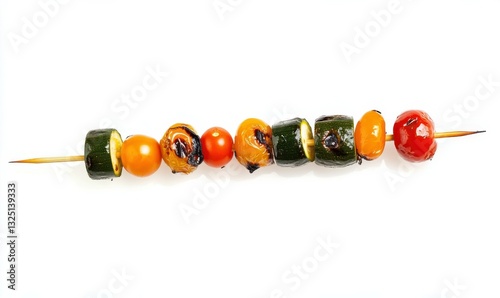 A grilled vegetable skewers with zucchini, bell peppers, and cherry tomatoes. Isolated on White Background photo