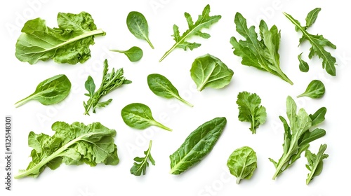 Various green vegetables spread on a white