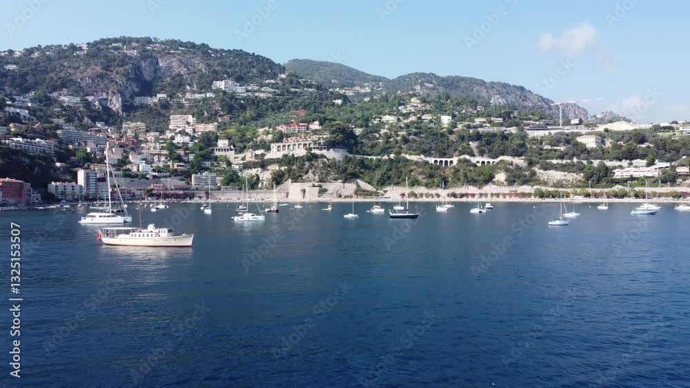 Aerial view of a serene harbor with boats on tranquil water Aerial view of a serene harbor with boats on tranquil water